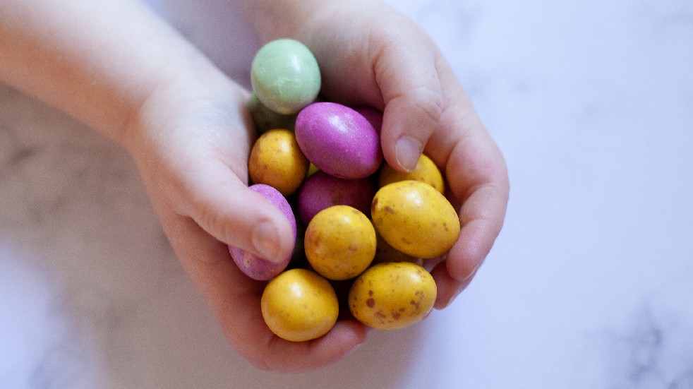 hands holding mini eggs